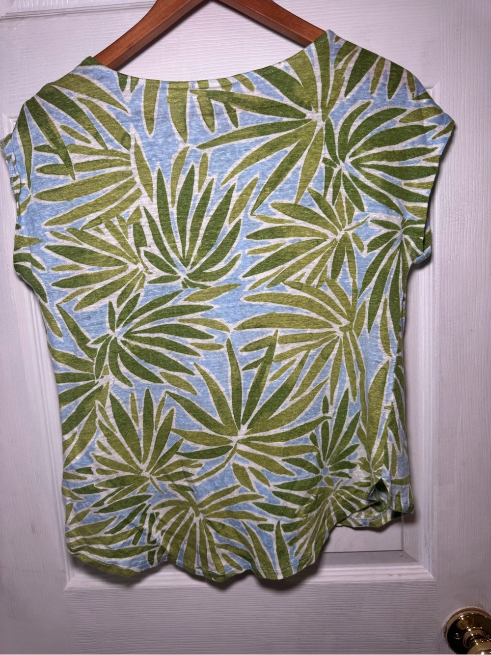 Sigrid Olsen Green Palm-Print Cap Sleeve Top with Light Blue Background